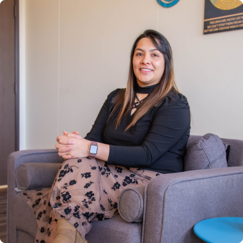 Therapist guiding an Individual Counseling conversation with an adult client in Lone Tree - CO office